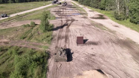 Flying front and over armoured column Stock Footage 250979809