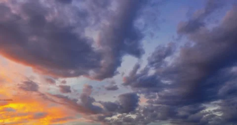 Flying golden clouds at sunset Stock Footage 187538324