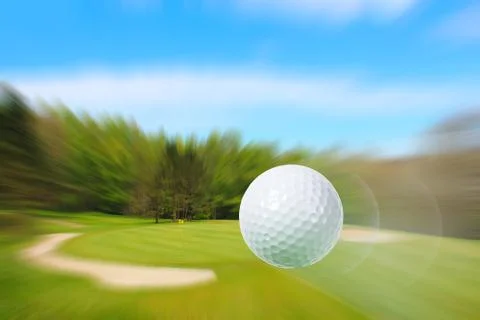 Flying golf ball Stock Photos