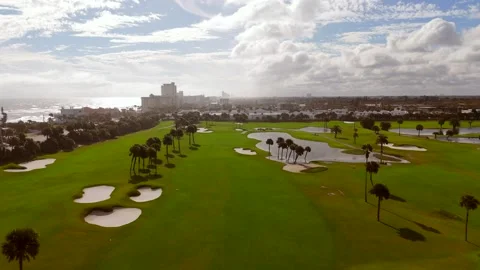 Flying golf ball simulation on fairway to flag Stock Footage 256324637