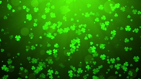 Flying Green Clovers on Black Background with green lighting, St. Patrick's.. Stock Footage 346473315