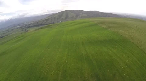 Flying by a green valley, fish eye Stock Footage 54577337