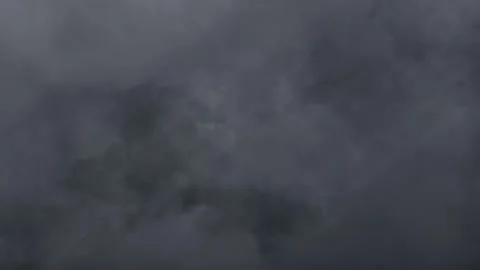 Flying in Grey Clouds Stock Footage 151153997