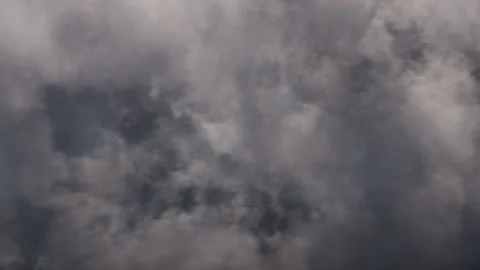 Flying in Grey Clouds Stock Footage 151154020