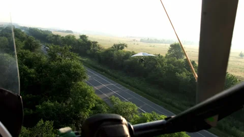 Flying on a hang glider with an engine, flying over a paraglider Stock Footage 172101873