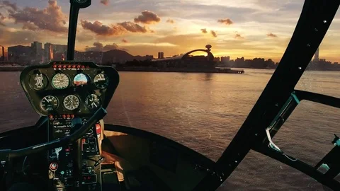 Flying a helicopter over water Видео 73807166