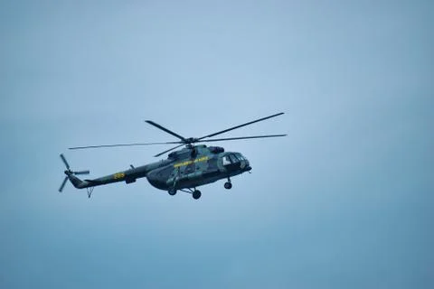 A flying helicopter Stock Photos