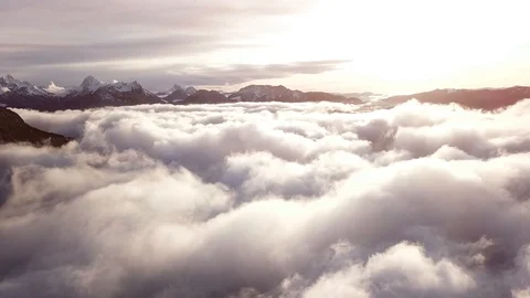 Flying high above clouds, epic cloudscape aerial 4K footage, Alps mountains Stock Footage 119973886