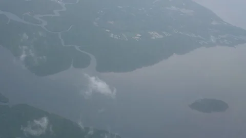 Flying high up around the earth and islands Stock Footage 93978881