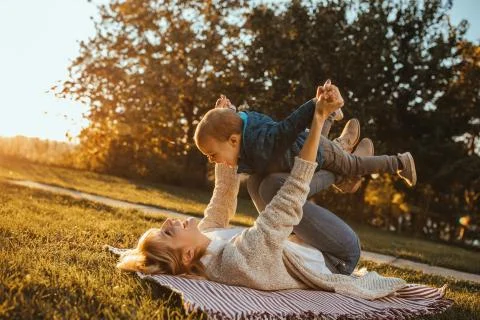 Flying high with mom Stock Photos