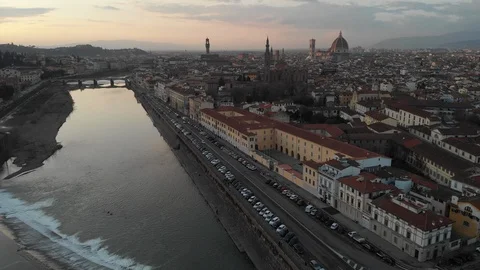 Flying High over the Arno river with Firenze in the background. Stock Footage 125704920