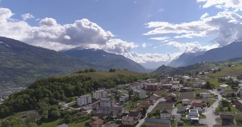 Flying high over Champlan, Sion - Aerial 4K - Phantom 4 PRO Video stock 77064167