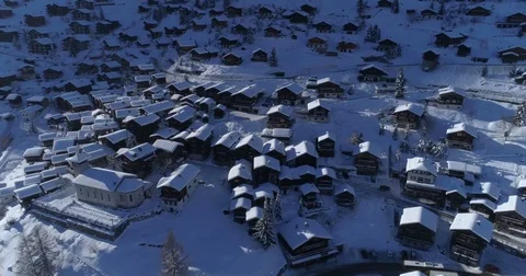Flying high over Grimentz roofs - Aerial 4K Stock Footage 83690371