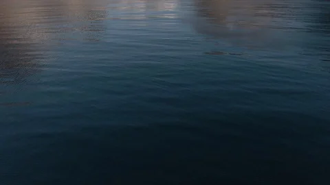 Flying High Over a Lake Tilting Up to Reveal the Mountains In Lofoten Stock Footage 116359471