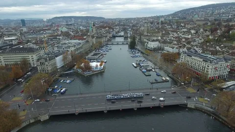 Flying high over Limmat river into Zurich Stock Footage
