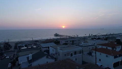 Flying high over Manhattan Beach, Los Angeles, California - * Unedited * Video stock 90104853