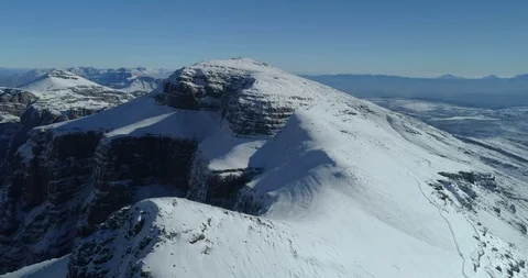 Flying High Over Snow Covered Mountain Peaks Stock Footage 92331370