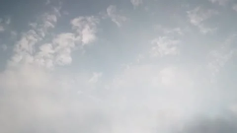 Flying high through the white cloud and blue sky, A View From The Airplane Stock Footage 158017173