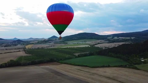 Flying hot air balloon in evening after sunset. Stock Footage 170381704