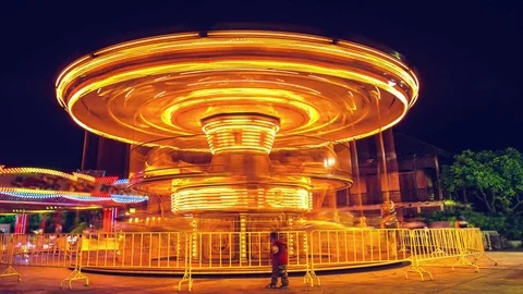 Flying house carousel is play the lighting at night. Stock Footage 81518949