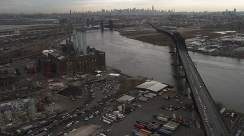 Flying up the Hudson River over an industrial area between the Pulaski Skyway Stock Footage 59172210