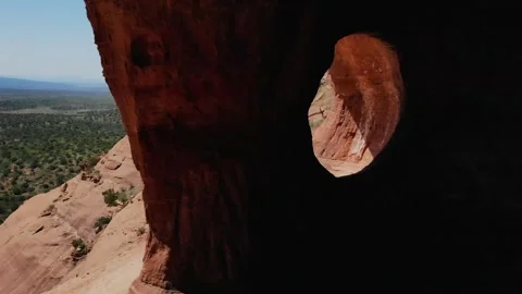 Flying inside a cave with window. Red Sandstone Mountain At Sedona 스톡 동영상 241756372