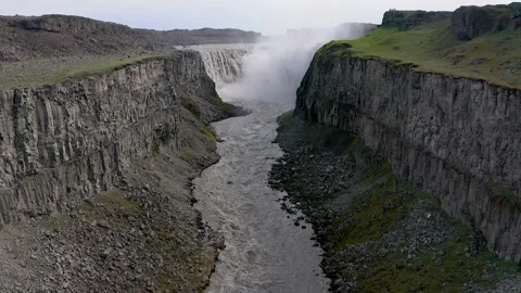 Flying inside a great canyon to Detifoss Waterfall. Stock Footage 249264374