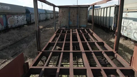 Flying inside an old rusted wagon train Stock Footage 219743941