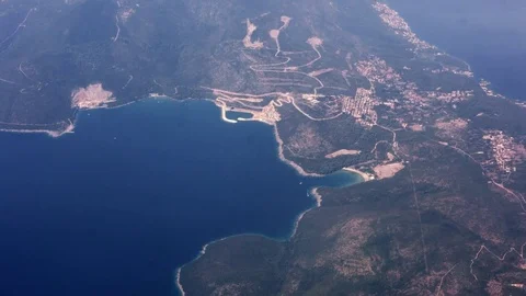 Flying on jet plane over the seacoast, travelling by air Video stock 71815052