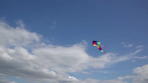 Flying kite against background blue sky on cloudy day in summer. Stock Footage 158212164