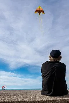 Flying a Kite in the sky Stock Photos