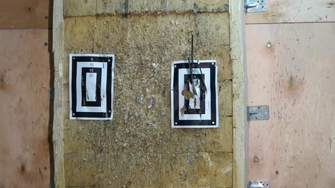 Flying knife. Man is throwing the knife. Tournament. Knife throwing Stock Footage 89323953