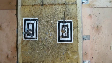 Flying knife. Man is throwing the knife. Tournament. Knife throwing Stock Footage 89323958