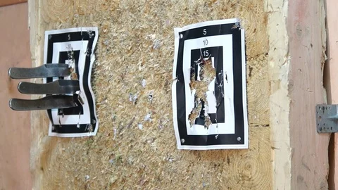 Flying knife. Man is throwing the knife. Tournament. Knife throwing Stock Footage 89323998