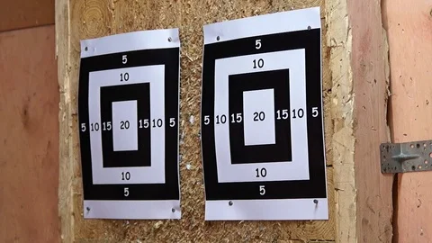 Flying knife. Man is throwing the knife. Tournament. Knife throwing Stock Footage 89324032