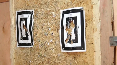 Flying knife. Man is throwing the knife. Tournament. Knife throwing Stock Footage 89472147