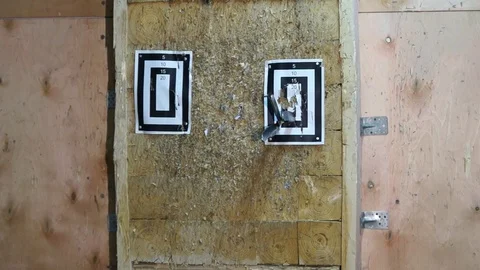 Flying knife. Man is throwing the knife. Tournament. Knife throwing Stock Footage 89602334