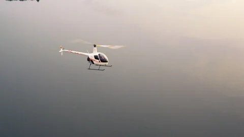 Flying, Lake, Helicopter, Side View, Outdoors, Day, Wide Shot, 30 Seconds Or Stock-Footage 95821586