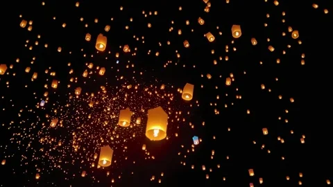 Flying lanterns in night sky in Loy Krathong festival, Chiangmai, Thailand Stock Footage 262954221