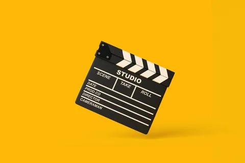 Flying lapperboard isolated on bright yellow background in pastel colors Stock Illustration