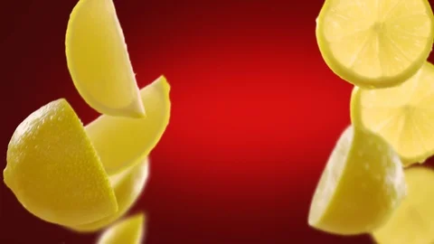 Flying of Lemon and Slices in Deep Red Background Stock Footage 123500485