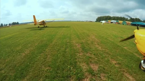 Flying in a light airplane. The camera is attached to the wing of the aircraft Stock Footage 73671916
