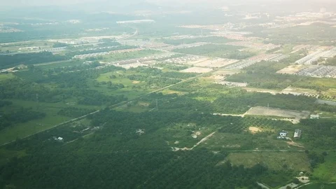 Flying at Low Altitude over Kuala Lumpur Suburbs Stock Footage