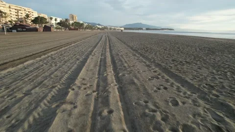 Flying low and fast over the beach Stock Footage 232984585
