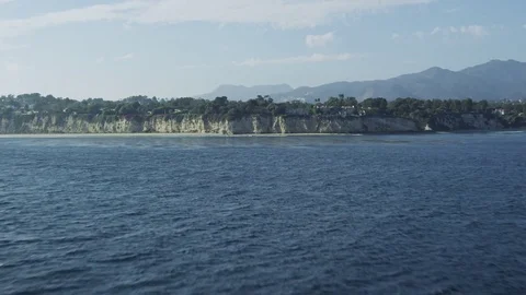 Flying low at cliffs Stock Footage 77844407