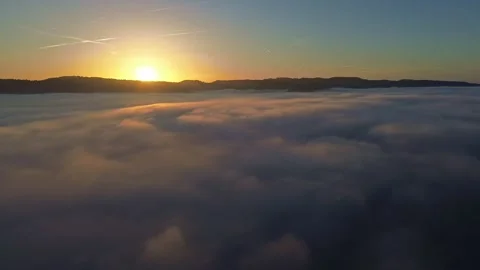 Flying into Low Hanging Clouds into the Dark at Sunset 4k Drone Stock Footage 294097737