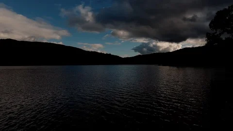 Flying low-level over Lexington Reservoir in the evening. 库存影片 95561102