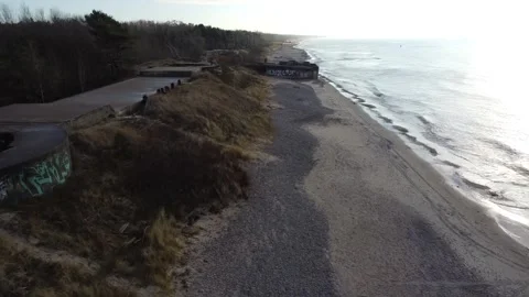 Flying Low Over Baltic Sea Toward Historic Klaipėda Bunker Stock Footage 330231923