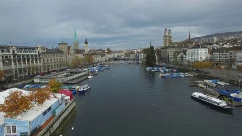 Flying low over Limmat river into Zurich Stock Footage 71100359