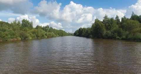 Flying low over muddy river 4k aerial Stock Footage 82810917